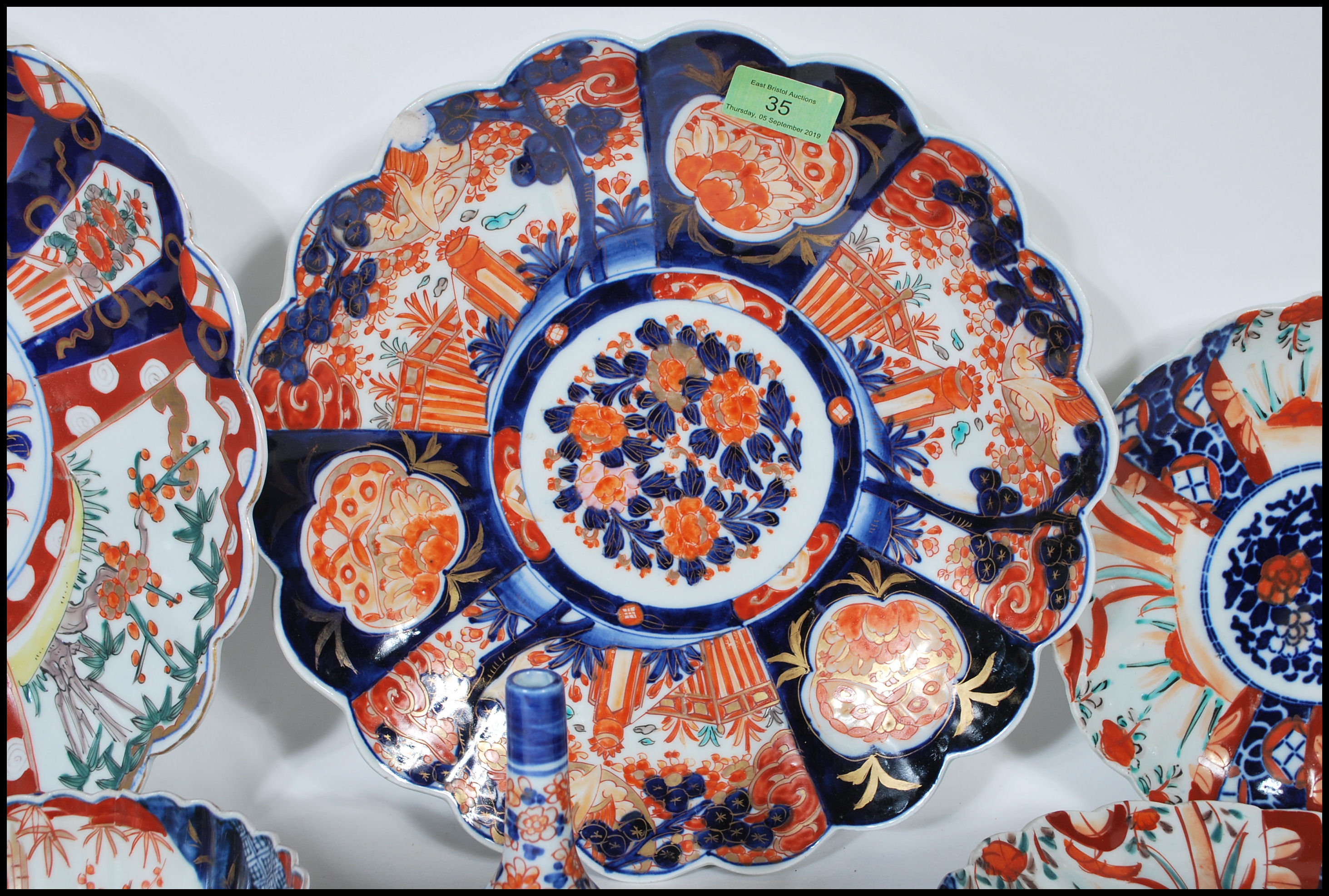 A collection of 20th Century Japanese Imari ceramics to include two wall charger plates having - Image 4 of 15