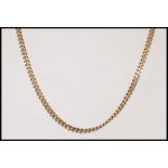 A stamped 375 9ct gold flat link necklace chain. Weight 18.1g. Measures 51cm long.