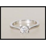 A hallmarked 950 platinum single stone round cut diamond ring of approx 40 points. Hallmarks for