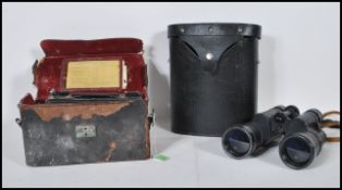 An early 20th Century Cine' Kodak Model BB camera in original leather fitted case with extra