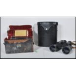 An early 20th Century Cine' Kodak Model BB camera in original leather fitted case with extra