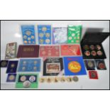 A collection of mostly 20th Century commemorative and mint cons to include coins of Great Britain
