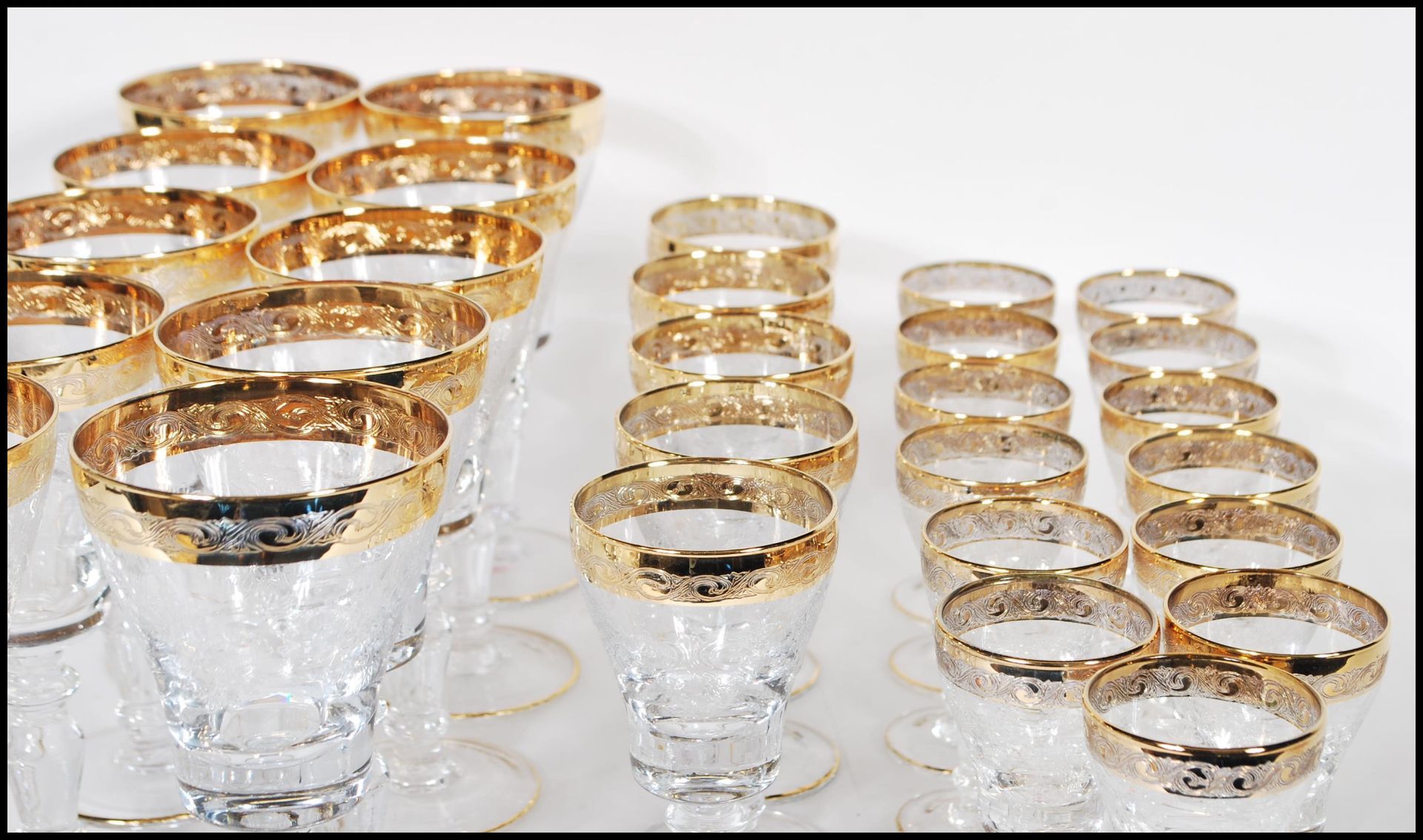 A large collection of glassware having scrolled decoration to the bowls raised on knopped columns on - Bild 3 aus 7