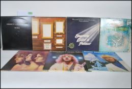 A collection of vinyl long play LP record albums to include Emerson, Lake and Palmer Trilogy,