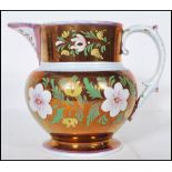 A 19th Century Sunderland lustre pearlware jug having a copper coloured glaze to the body and