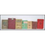 A collection of vintage early 20th Century motorcycle and motor car hand books to include 'Motor