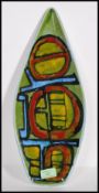 A vintage 1970's Poole pottery Delphis platter of tear drop form having green, yellow and red