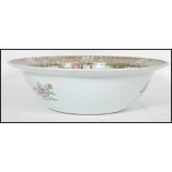 A large 19th Century Canton Chinese famille verte large centrepiece bowl decorated with green and