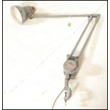 A 1940's Industrial enamelled metal anglepoise desk lamp by Admel ' Fingalite '. The lamp with