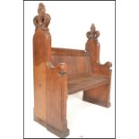 A 19th Century Victorian oak ecclesiastical church pew, panel back with solid seat flanked by