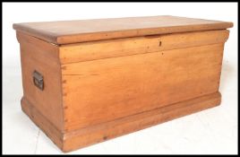 A 19th Century Victorian pine blanket box chest, hinged top with open storage, carry handles to
