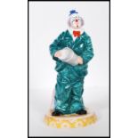 A Royal Doulton Circus clown figurine titled ' Will He - Won't He? ', HN3275 modelled by Robert