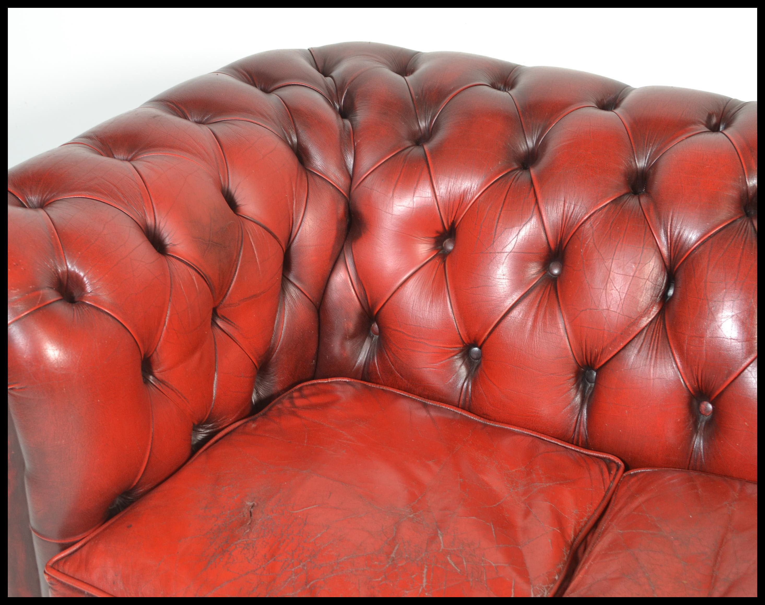 A 20th Century Oxblood leather upholstered chesterfield two seater sofa, having buttoned rounded - Image 3 of 4