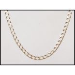 A stamped 9ct gold flat link necklace chain having a lobster clasp. Weight 14.7g. Measures 62cm