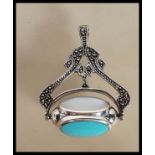 A sterling silver and marcasite Art Nouveau style fob pendant set with onyx, turquoise and rose