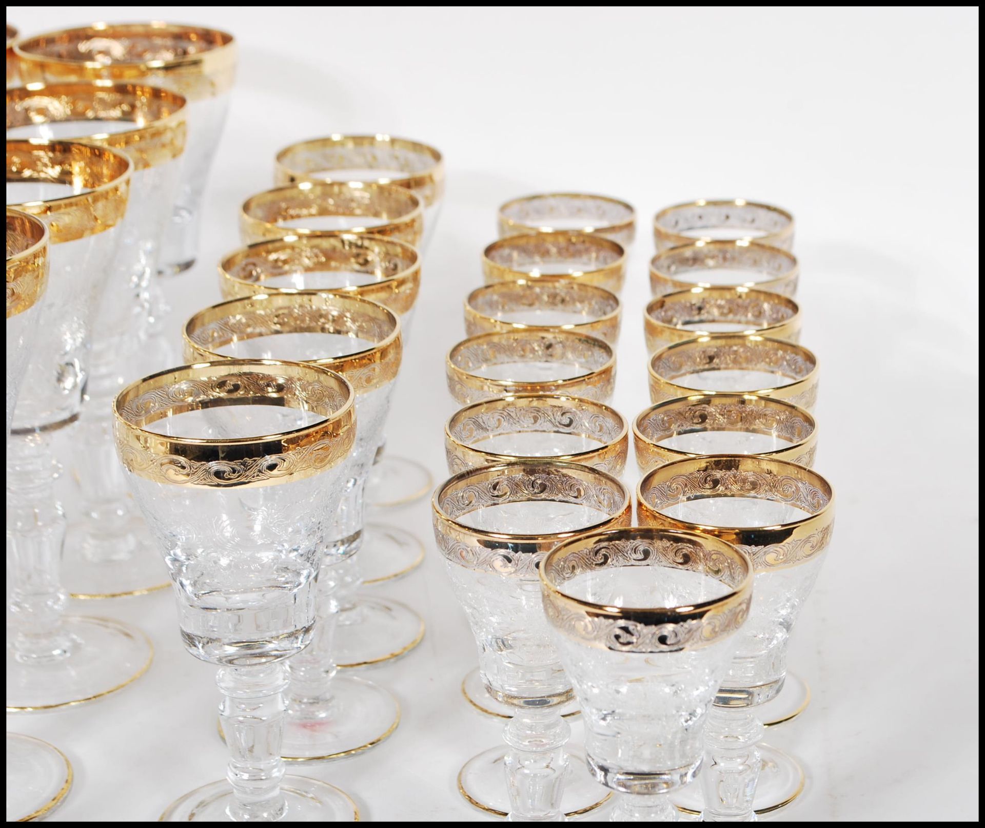 A large collection of glassware having scrolled decoration to the bowls raised on knopped columns on - Bild 4 aus 7