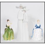 Two Royal Doulton figurines to ladies including Fleur HN2368 and Alison HN 2336 and a Lladro