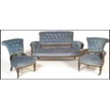 A Victorian aesthetic movement ebonised with gilt decoration lounge suite of a two seater sofa