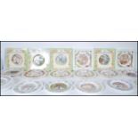 A group of 22 Royal Doulton Brambly Hedge ceramic collectors plates along with a wall clock to