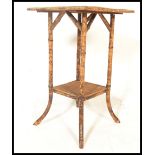 A Victorian 19th century Bamboo aesthetic movement occasional / bedside table. Raised on splayed