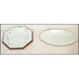 Two vintage retro mid 20th Century frameless wall mirrors to include an octagonal mirror with acid