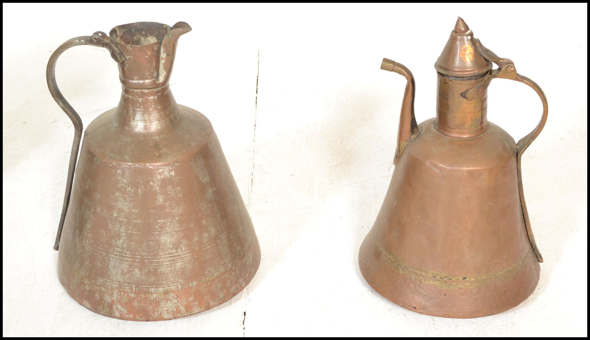 A 19th Century copper milk churn together with two Persian style hand worked coffee pots and a - Image 5 of 8