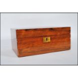 A 19th Century Victorian Walnut veneered writing slope having brass inlay with a fitted interior,