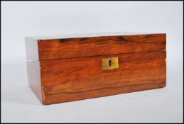 A 19th Century Victorian Walnut veneered writing slope having brass inlay with a fitted interior,