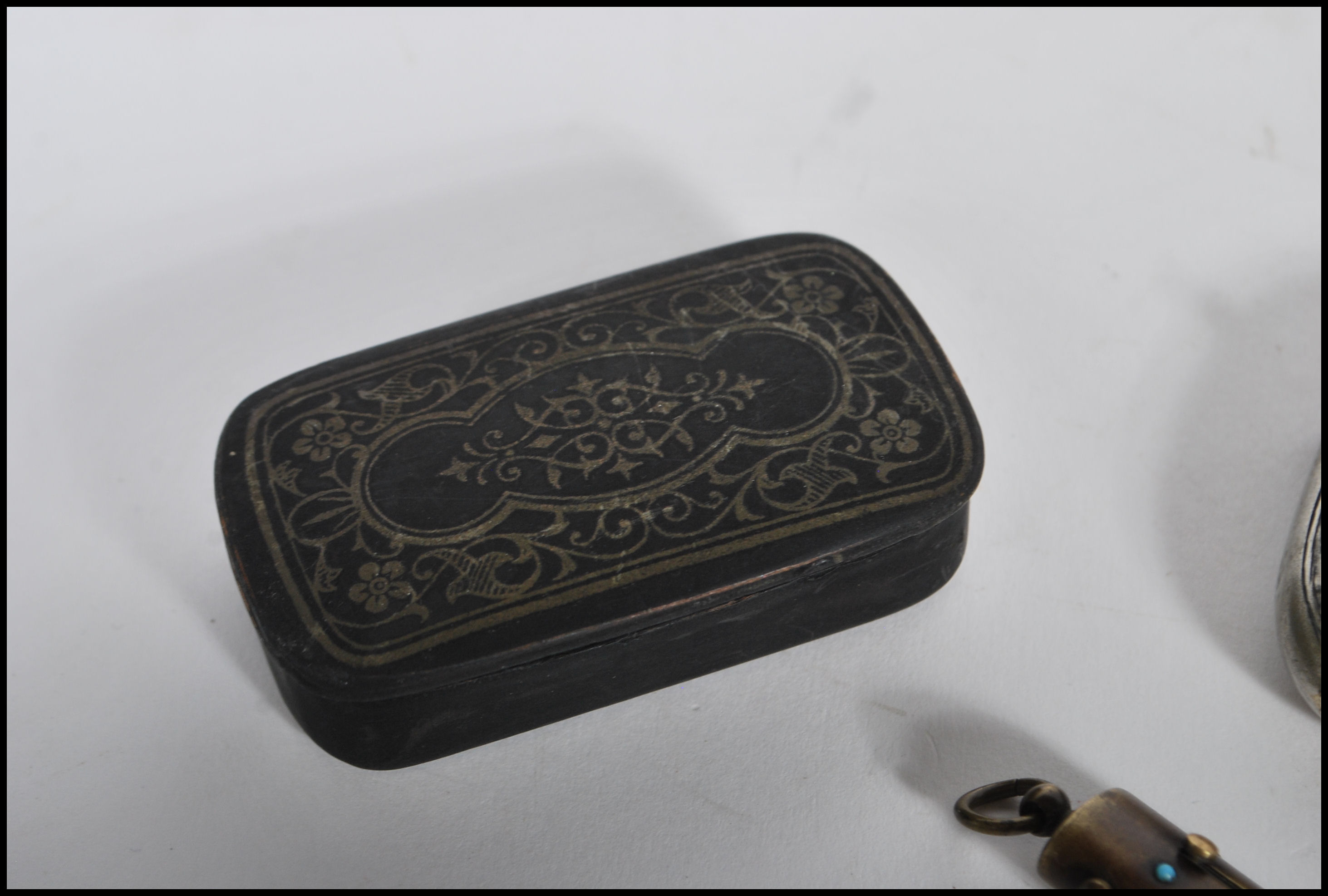 A selection of tools and cases to include a Georgian ebonised snuff box having scrolled foliate - Image 2 of 6