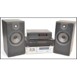 HI-FI- A Kenwood compact disc player model DP-4030 finished in black, Philips cassette deck model