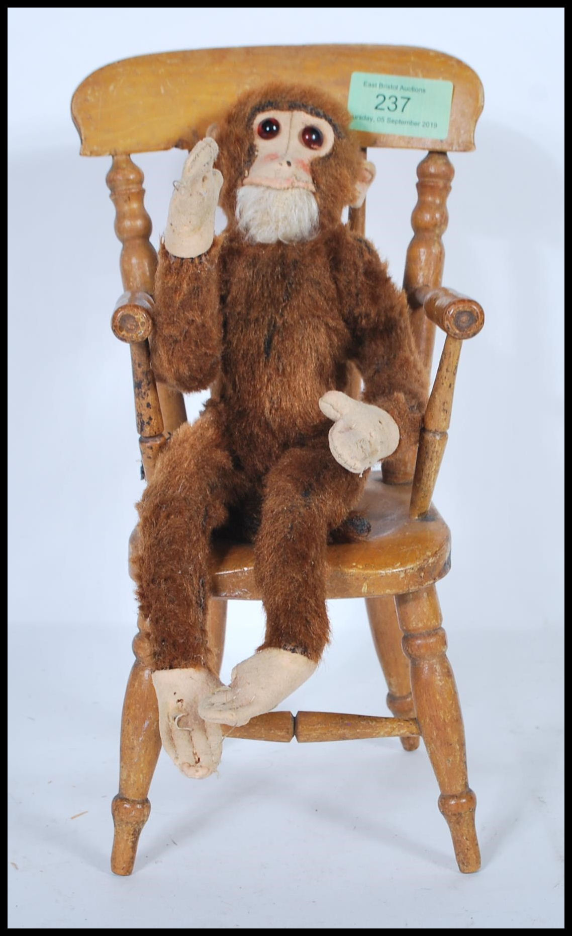 A vintage 1950's Merrythought made soft toy straw filled monkey with bead eyes and original label - Image 2 of 5