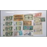 A collection of bank notes, most being 20th Century British to include a Five Shillings Note from