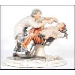 A Capodimonte ceramic figurine depicting a dentist extracting a tooth from a patient, raised on a