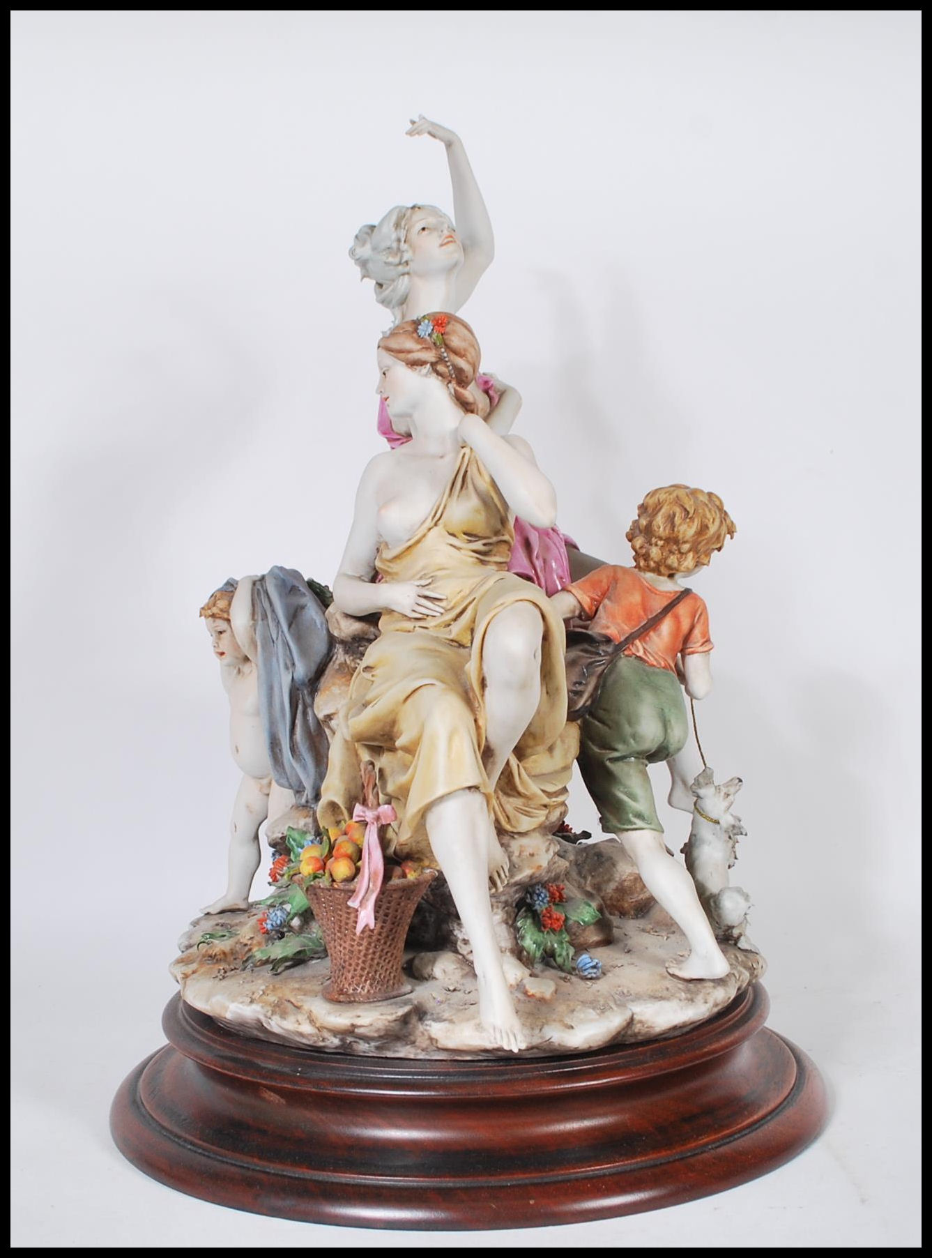 A large Capodimonte ceramic figure group depicting three figures depicting two women in draped - Image 2 of 5