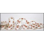 An extensive Royal Albert Old Country Roses tea service / dinner service having a white ground