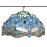 A vintage 20th Century Tiffany style leaded glass hanging ceiling light shade in blue and green