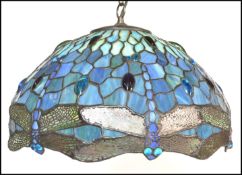 A vintage 20th Century Tiffany style leaded glass hanging ceiling light shade in blue and green