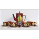 A Carlton Ware Art Deco coffee service in the ' Egyptian Fan ' Design. Pattern No 3558. Mottled