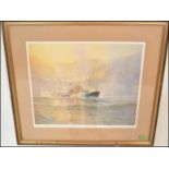 A framed and glazed limited edition picture print depicting The Clovelly Lifeboat, Michael Lees