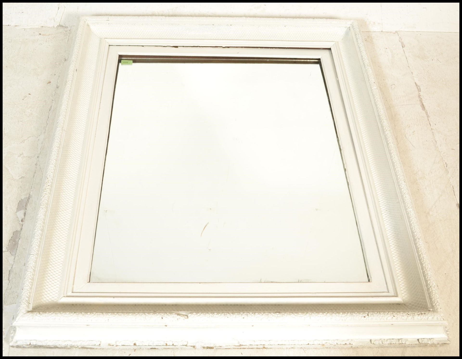 A large 19th Century Victorian gesso picture frame, later paint finish to the ornate moldings having