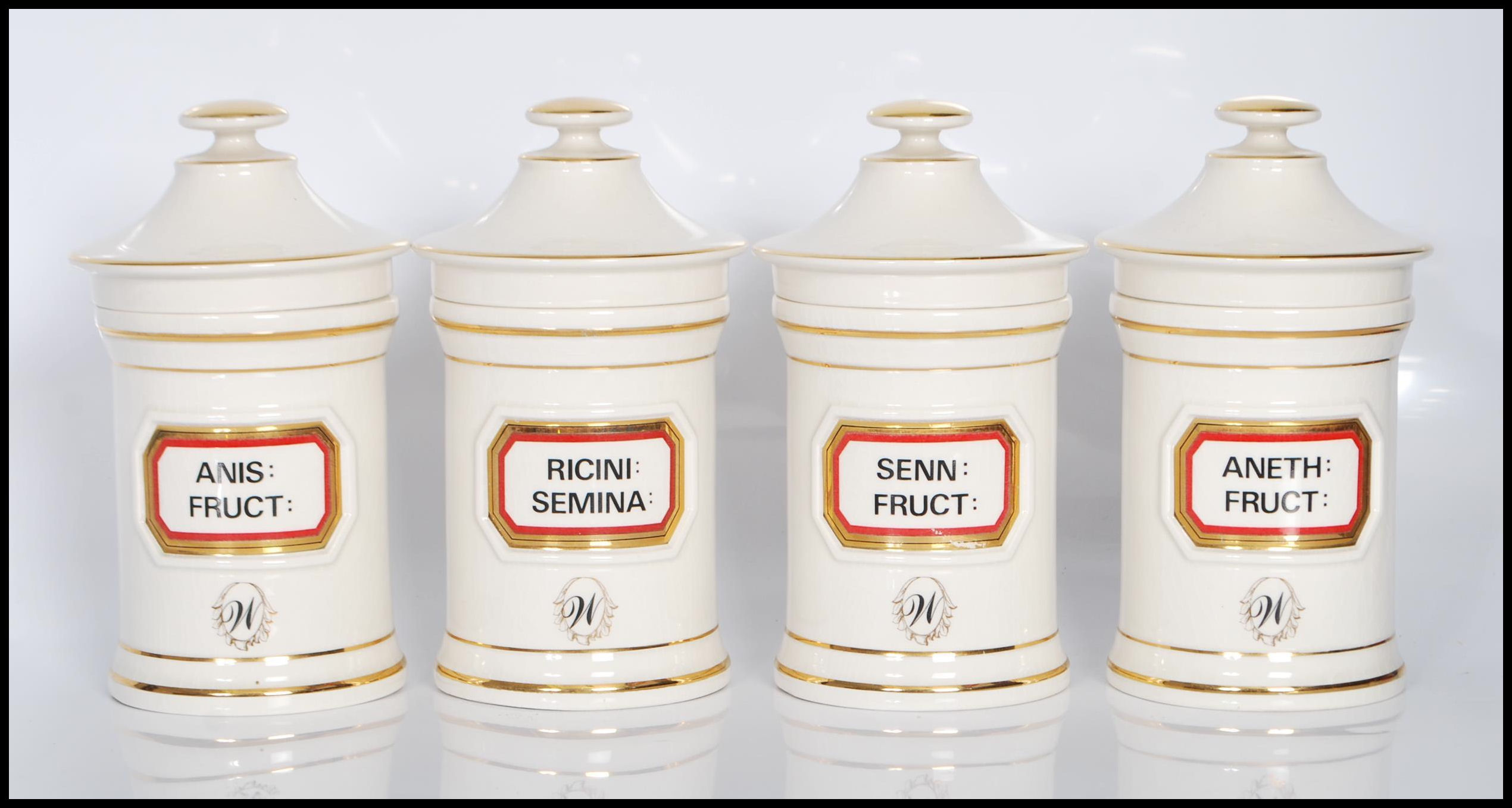 A group of twelve 20th Century Chalsyn Ltd ceramic apothecary jars and covers all having white - Image 8 of 10