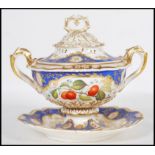 A 19th Century English Regency lidded ceramic twin handled tureen having detailed floral gilt work