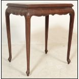 A 20th Century Chinese hardwood occasional side table , the square top above shaped upright supports