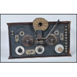 A early 20th Century vintage pine cased Crystal radio receiver having dial and switches to front