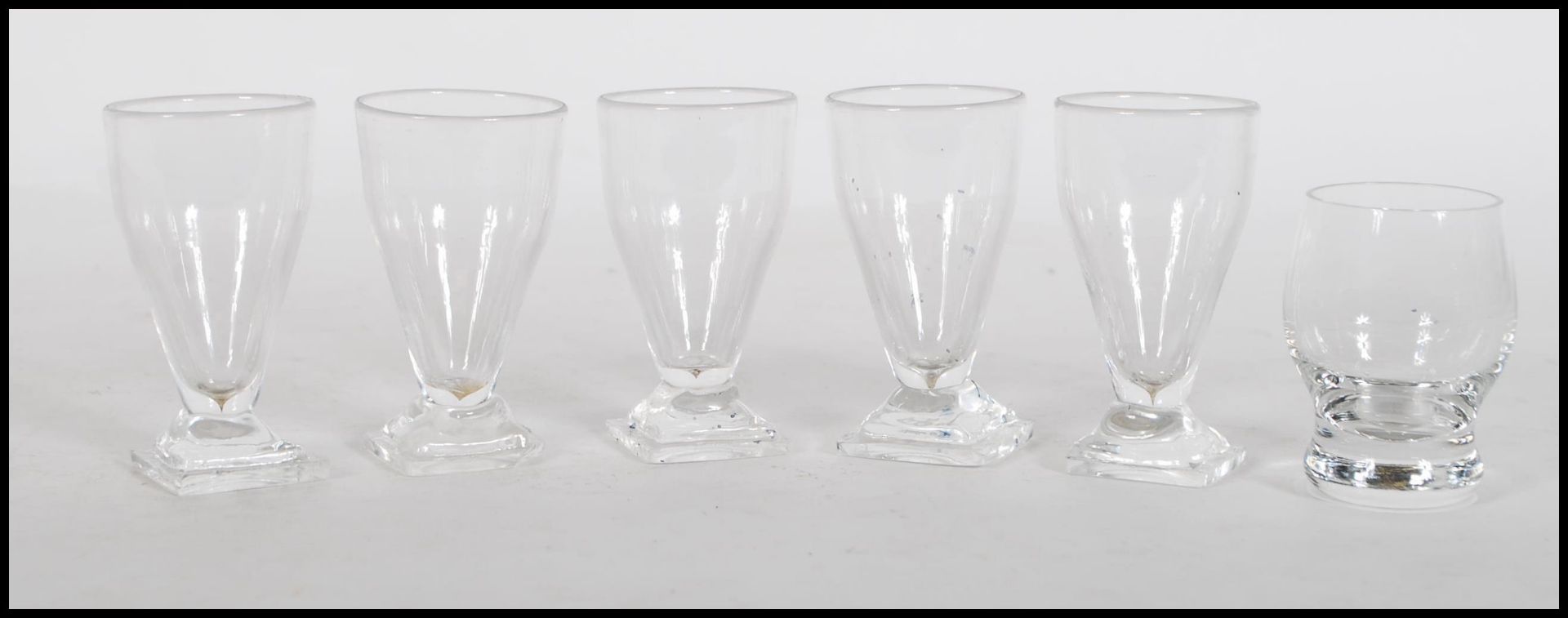A set of five 19th Century hand blown liqueur / to