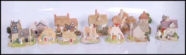 A collection of ten boxed Lilliput Cottages to include Blue Boar, To Have And To Hold, Cradle