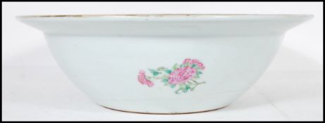 A large 19th Century Canton Chinese famille verte centrepiece bowl decorated with hand painted green