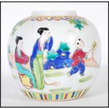 A 19th Century Chinese ginger jar having hand painted and enameled oriental scene of a child chasing
