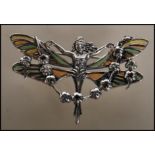 A stamped 925 silver and enamel plique a jour Art Nouveau style brooch in the form of fairy with her