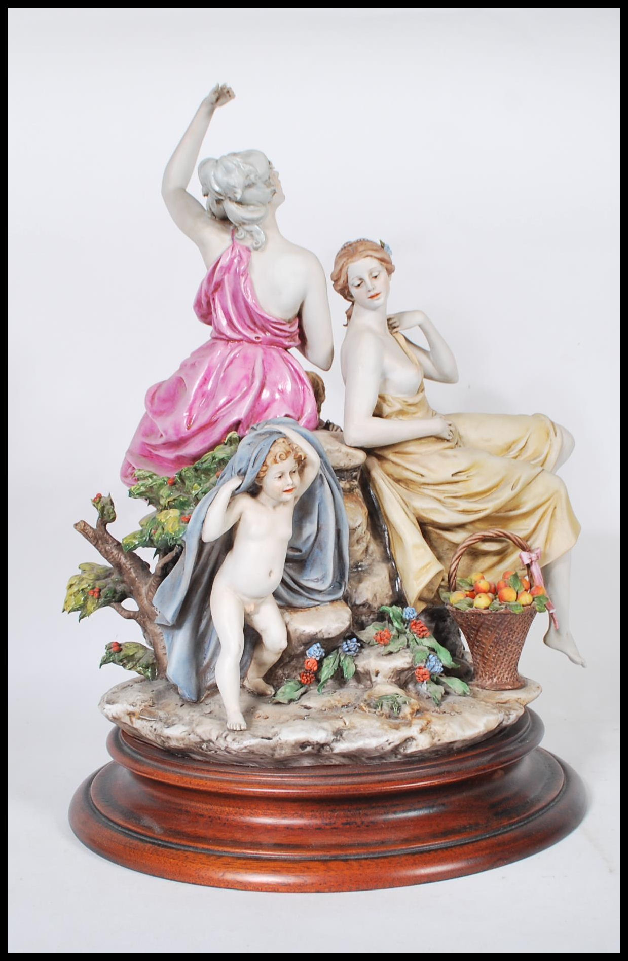 A large Capodimonte ceramic figure group depicting three figures depicting two women in draped - Image 3 of 5